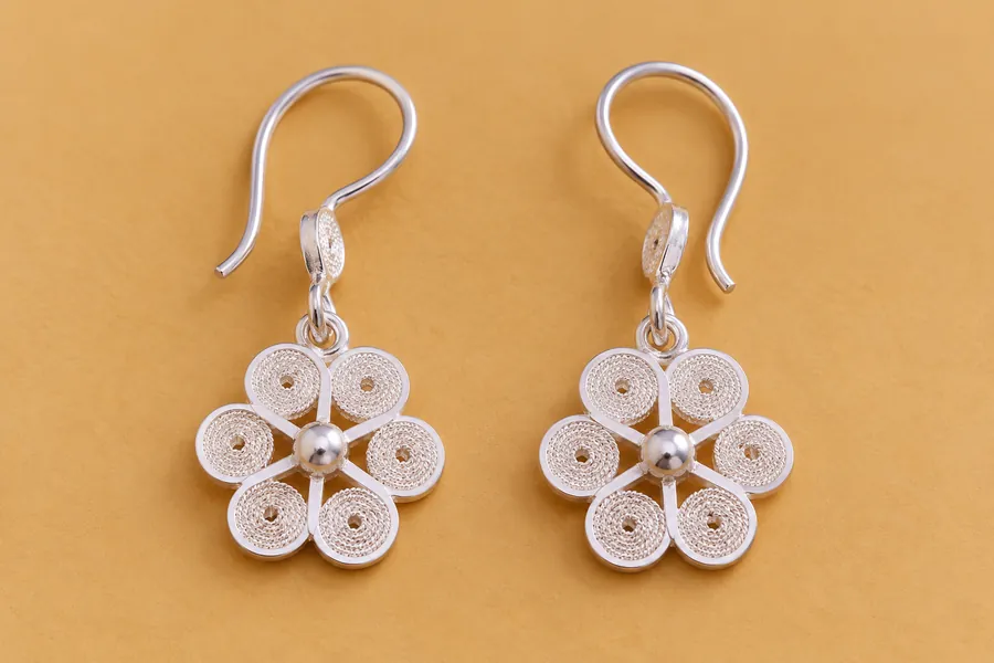 Silver filigree flower earrings from Mompox.